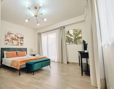 Letto o letti in una camera di CORTILIO Luxury Homes on Etna