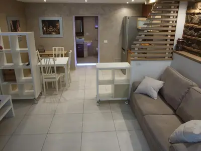 Area soggiorno di Borgo Apartment