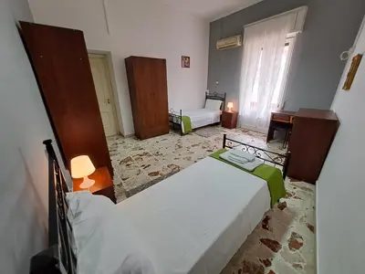 Letto o letti in una camera di B&B Domus Pina