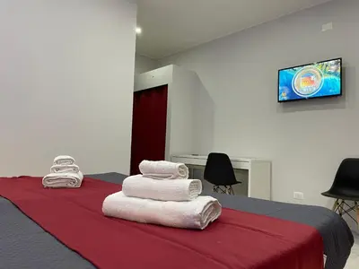 TV o dispositivi per l'intrattenimento presso Pacini 88 Rooms and apartment Catania Centro