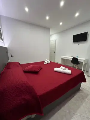 TV o dispositivi per l'intrattenimento presso Pacini 88 Rooms and apartment Catania Centro