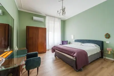 Letto o letti in una camera di Riva House Catania by Wonderful Italy
