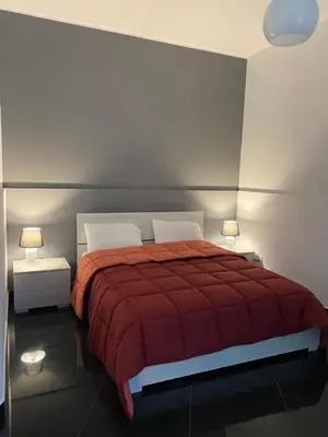 Letto o letti in una camera di CASA PIRANDELLO 12