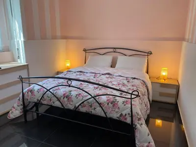 Letto o letti in una camera di CASA PIRANDELLO 12