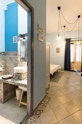Letto o letti in una camera di Al Palazzetto di Milo