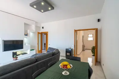 TV o dispositivi per l'intrattenimento presso Belvedere dell Etna - Ampio Appartamento con vista Mare e Taormina