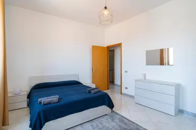 Letto o letti in una camera di Belvedere dell Etna - Ampio Appartamento con vista Mare e Taormina