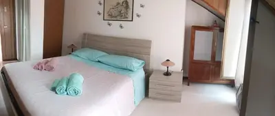 Letto o letti in una camera di Casa Reale