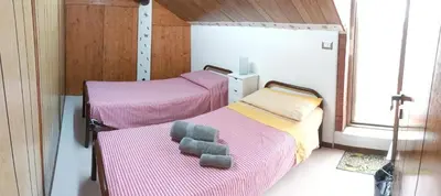 Letto o letti in una camera di Casa Reale