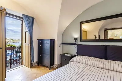 Letto o letti in una camera di La Casetta Azzurra
