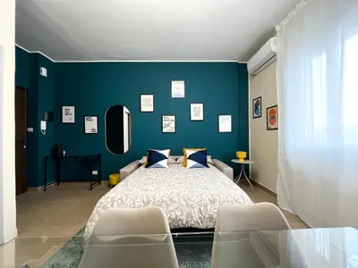 Letto o letti in una camera di Le Dimore del Corso