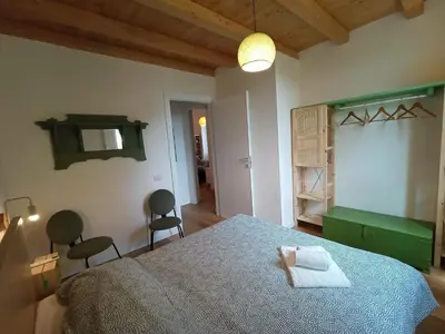 Letto o letti in una camera di Giardino Arancio - casa vacanze