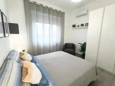Letto o letti in una camera di Orto Limoni Apartment - quadrilocale Catania Centro