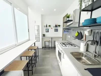 Cucina o angolo cottura di Orto Limoni Apartment - quadrilocale Catania Centro