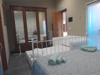 Letto o letti in una camera di La casa di Matilde