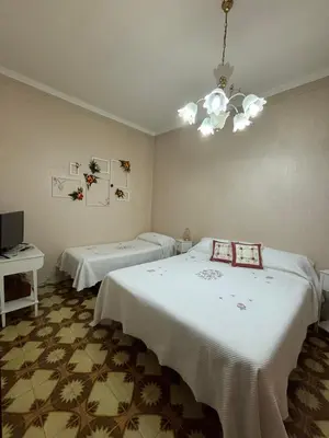 Letto o letti in una camera di Casa Centamore