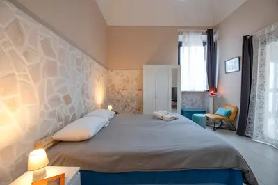 Letto o letti in una camera di Apartment Veneto, Catania Center