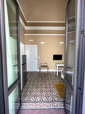 TV o dispositivi per l'intrattenimento presso Faraone Apartments