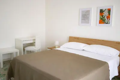Letto o letti in una camera di Donna Agata House