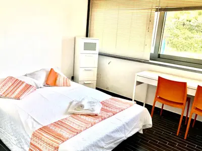 Letto o letti in una camera di Belvedere Faraglioni
