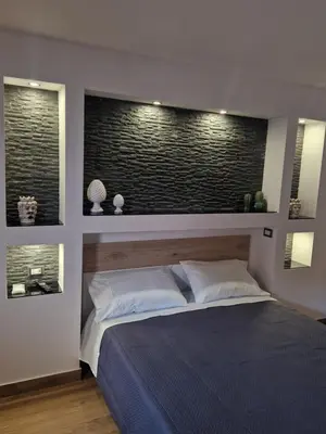 Letto o letti in una camera di Angel House oasi