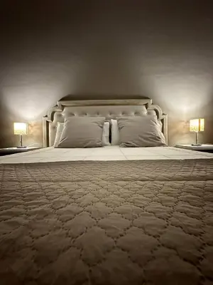 Letto o letti in una camera di Al Borgo Apartment
