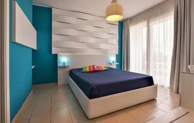 Letto o letti in una camera di 4 Bedroom Cozy Home In Mascalucia
