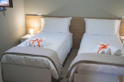 Letto o letti in una camera di Casa Sautu-fau