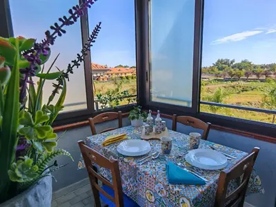 Balcone o terrazza di Blue Garden Home Isola Bella Taormina