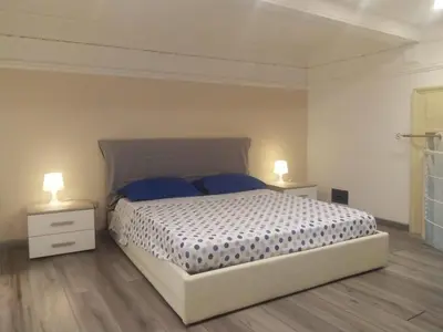 Letto o letti in una camera di Umberto 285 - Catania Centro