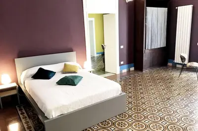 Letto o letti in una camera di Gemmellaro 32