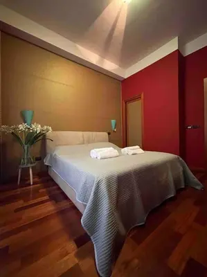 Letto o letti in una camera di Casa Elle