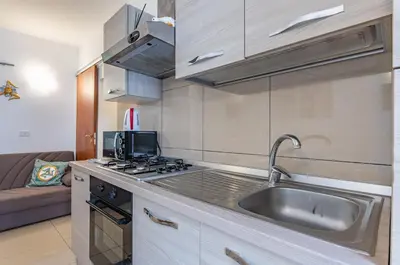 Cucina o angolo cottura di GuestHost - Catania Comfy & Central Apartment x3!