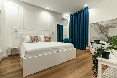 Letto o letti in una camera di AGF Luxury Apartment