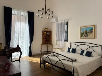 Letto o letti in una camera di Il Giardino Casa Vacanze