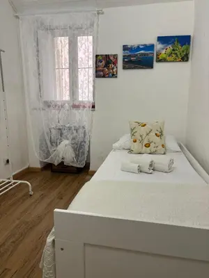 Letto o letti in una camera di Il Giardino Casa Vacanze
