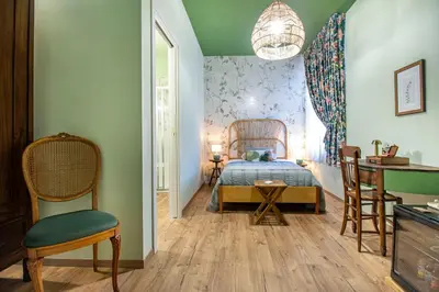 Letto o letti in una camera di Epimonì B&B