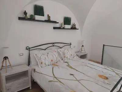Letto o letti in una camera di Domus Sicania