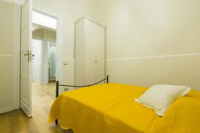 Letto o letti in una camera di Appartamento Martoglio - Casa Vacanze -