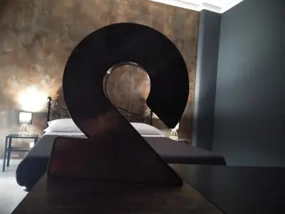 Letto o letti in una camera di Profili Siciliani B&b Ognina Catania