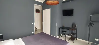 Letto o letti in una camera di Profili Siciliani B&b Ognina Catania