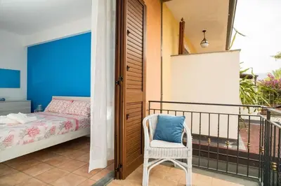 Letto o letti in una camera di La casa di Terry