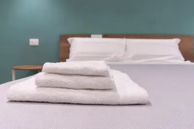 Letto o letti in una camera di CATANIA E DINTORNI LIVING ROOMS