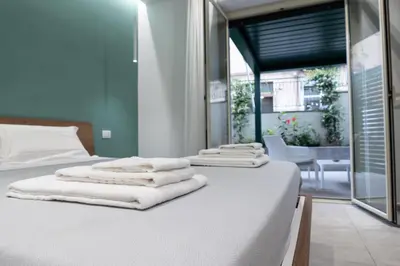 Letto o letti in una camera di CATANIA E DINTORNI LIVING ROOMS