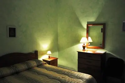 Letto o letti in una camera di B&B Villa Dagala
