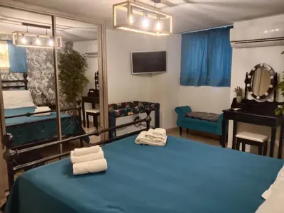 Letto o letti in una camera di Gina House