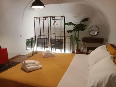 Letto o letti in una camera di Gina House