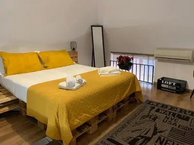 Letto o letti in una camera di Gina House