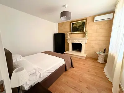 Letto o letti in una camera di Villa Asia