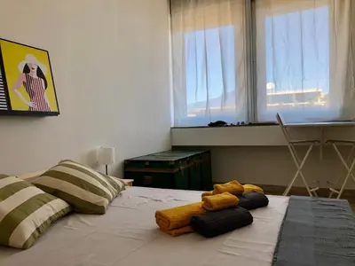 Letto o letti in una camera di Etna Market View